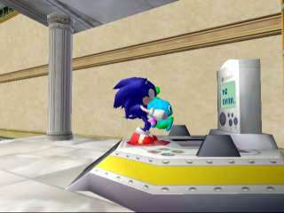 Sonic carrying a Chao near the VMS machine.