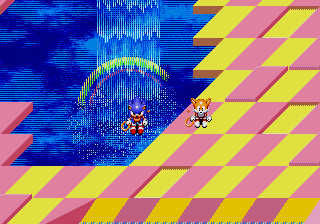 Sonic and Tails standing near the rainbow and waterfall.